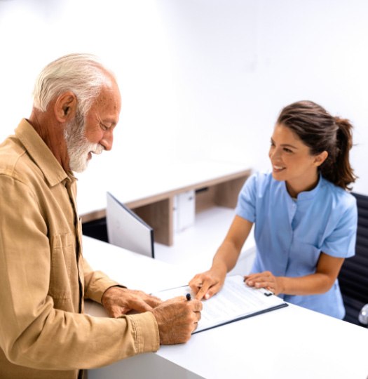team member talking with patients